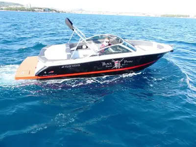 Exterior view of Black Pearl, a Four Winns Boats Four Winns H210 motorboat at Tribunj, Croatia