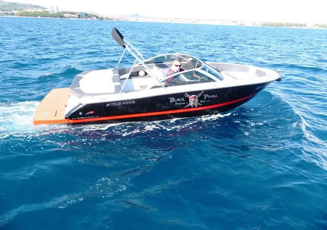 Exterior view of Black Pearl, a Four Winns Boats Four Winns H210 motorboat at Tribunj, Croatia