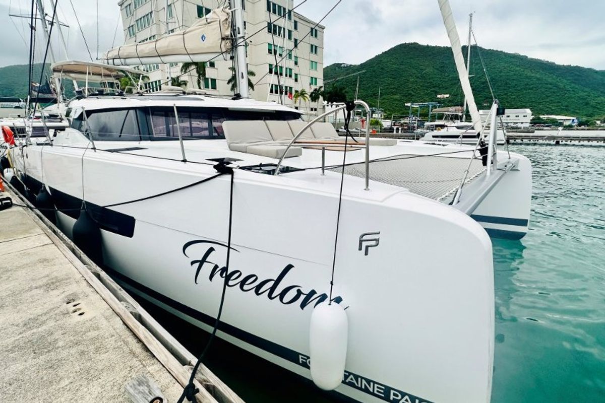 Exterior view of Freedom, a Fountaine Pajot Aura 51 catamaran at Road Town, British Virgin Islands