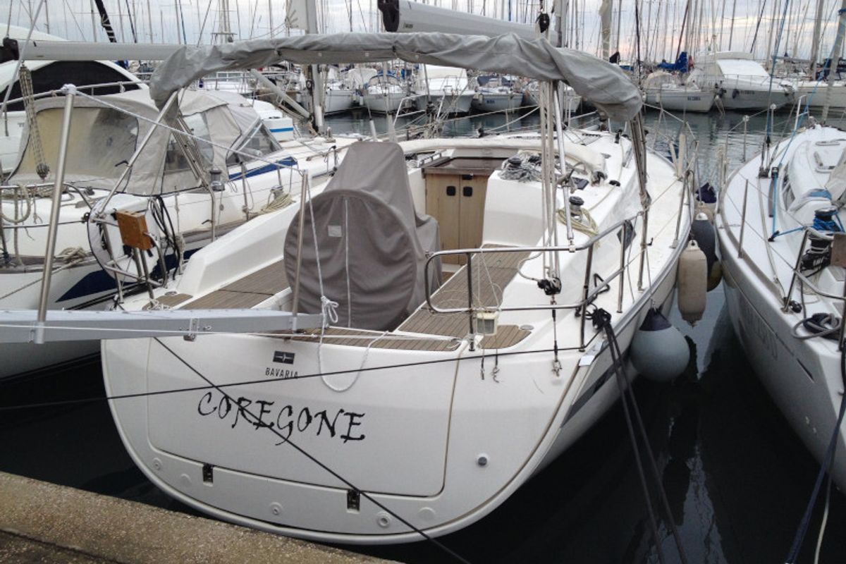 Exterior view of Coregone, a Bavaria 36 Cruiser sailboat at San Vincenzo, Italy