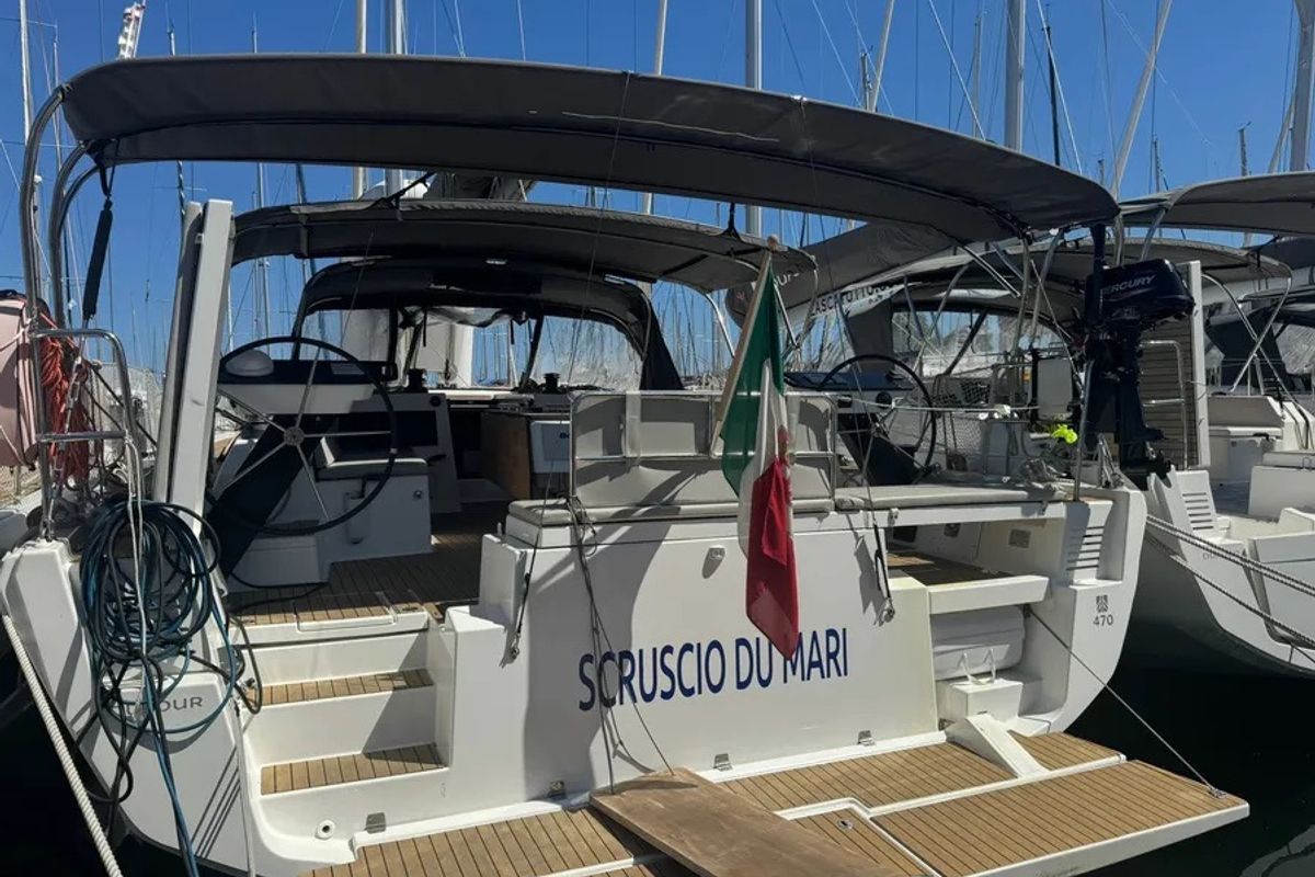 Exterior view of Scrusciu du Mari, a Dufour 470 sailboat at Procida, Italy