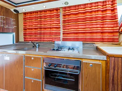 Galley of 1120R-23, a Pénichette 1120 motorboat at Argens-Minervois, France