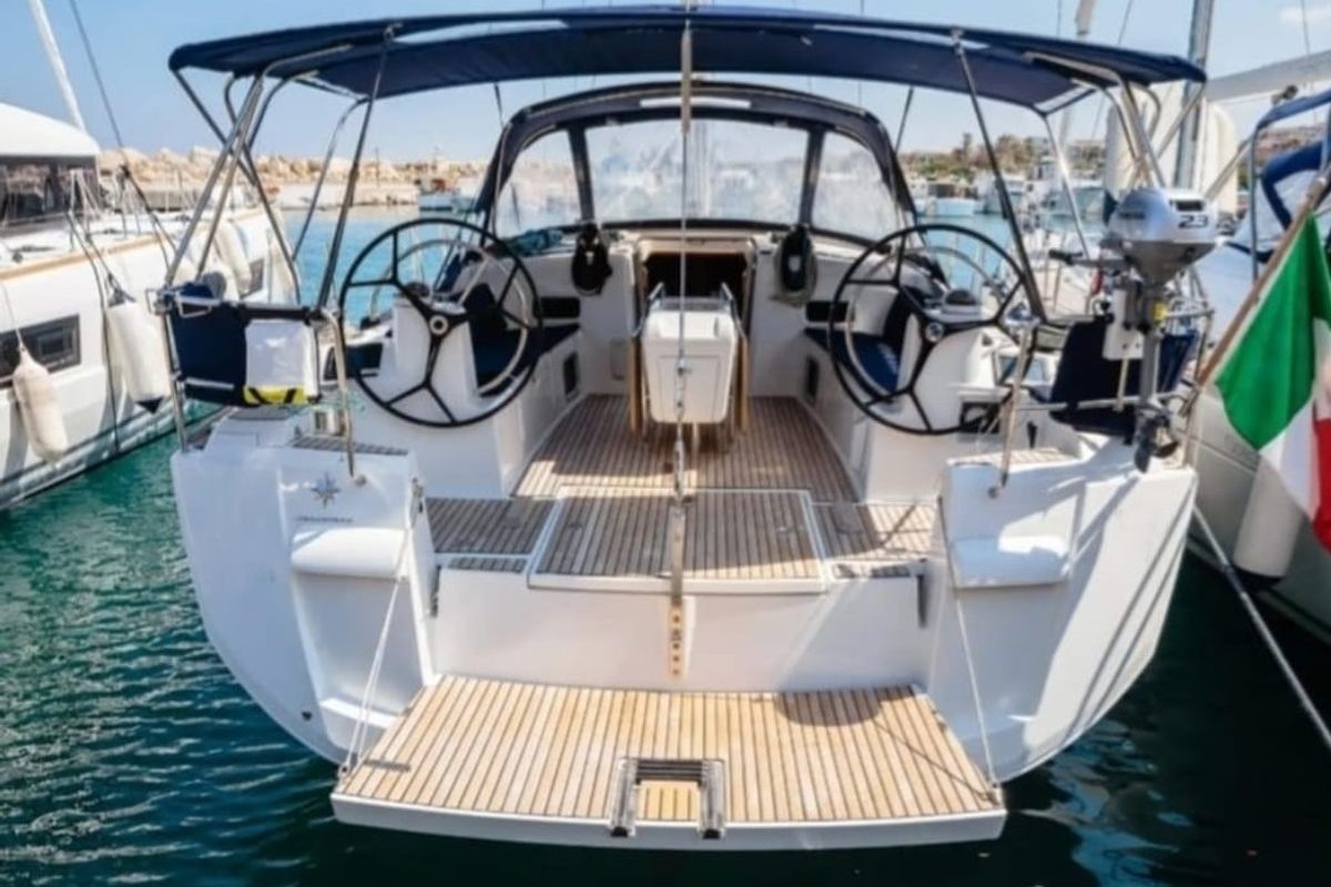 Exterior view of Kalos, a Jeanneau Sun Odyssey 519 sailboat at Tropea, Italy
