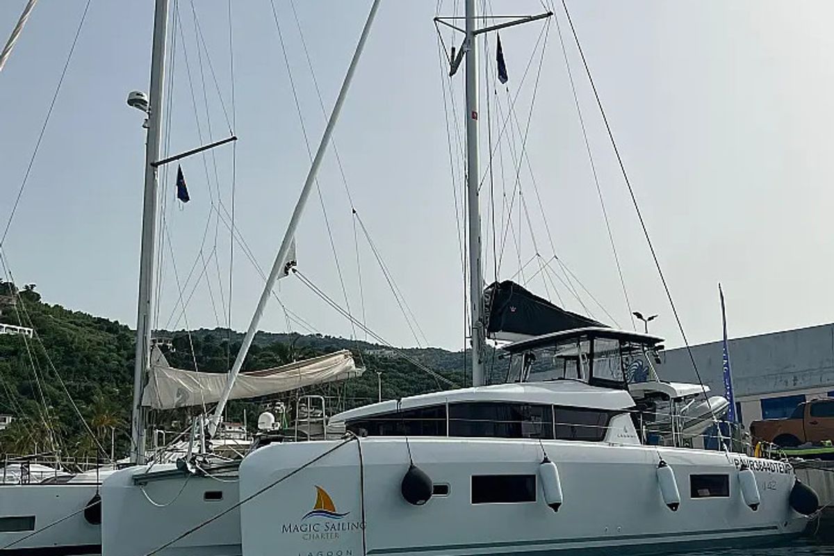 Exterior view of Capovento, a Lagoon 42 catamaran at Capo d'Orlando, Italy