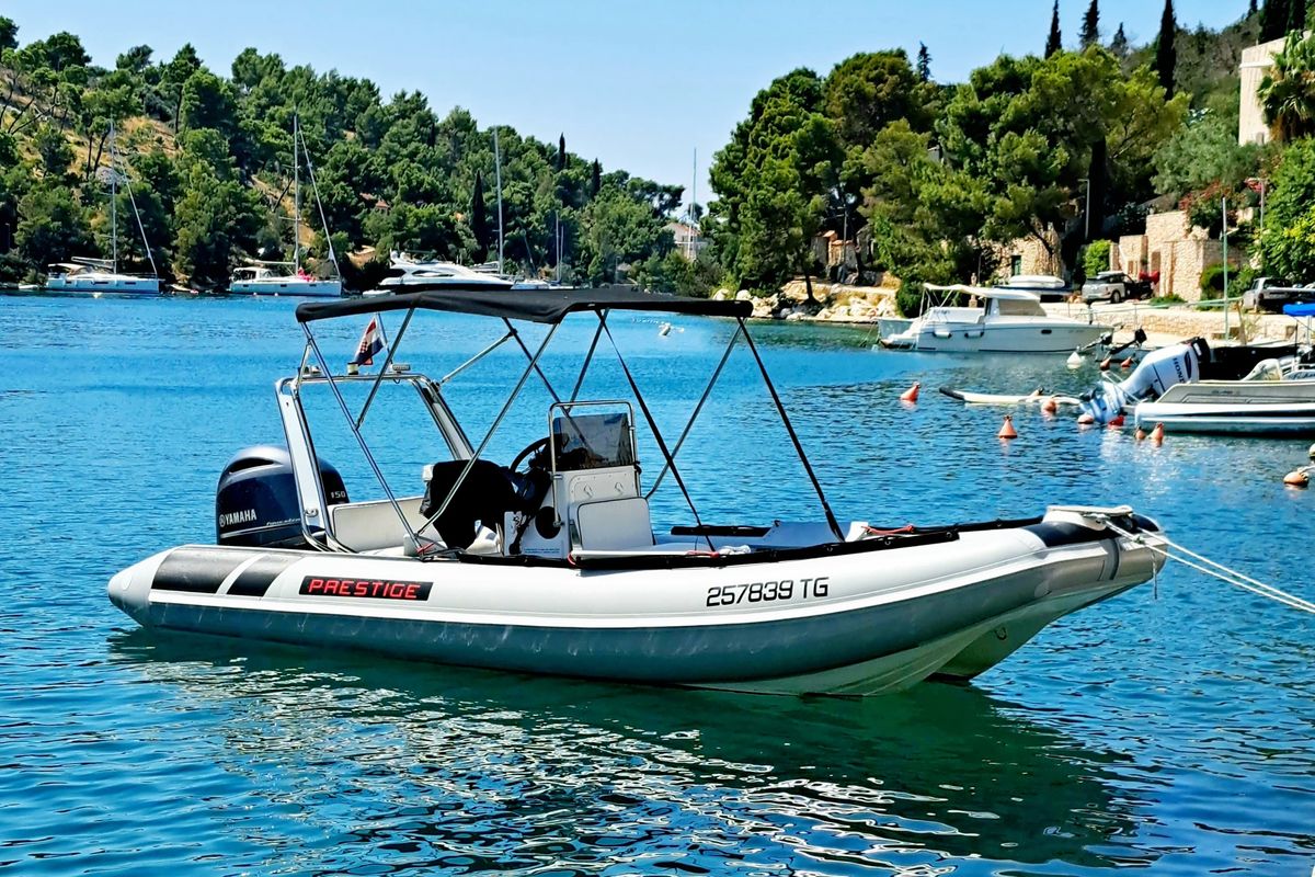 Exterior view of Niky, a Prestige Ranger 600 motorboat at Grad Trogir, Croatia