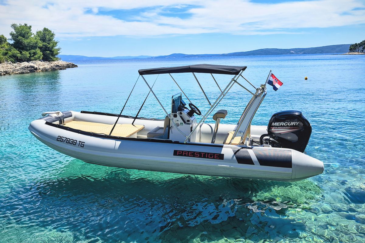 Exterior view of Niky, a Prestige Ranger 600 motorboat at Grad Trogir, Croatia