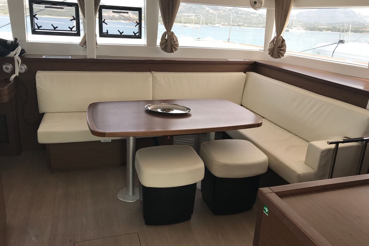 Salon of Cor Caroli, a Lagoon 450 Fly catamaran at Rosignano Solvay, Italy