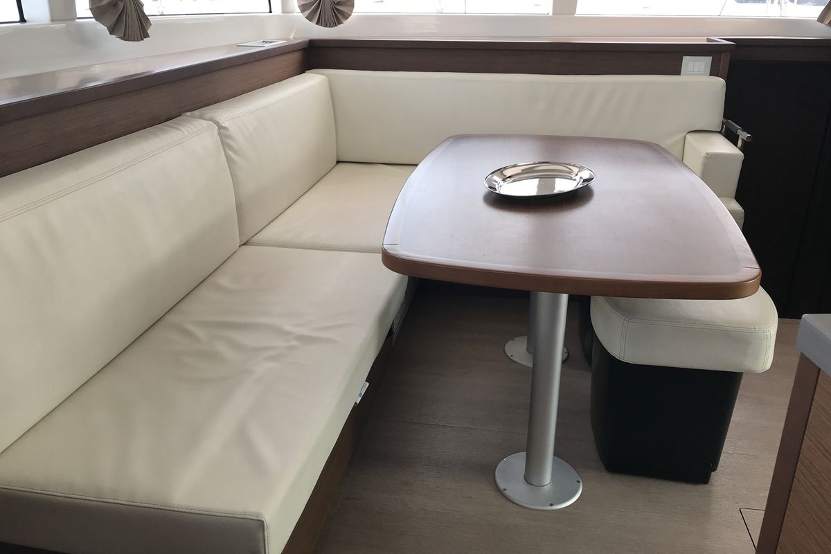Salon of Cor Caroli, a Lagoon 450 Fly catamaran at Rosignano Solvay, Italy