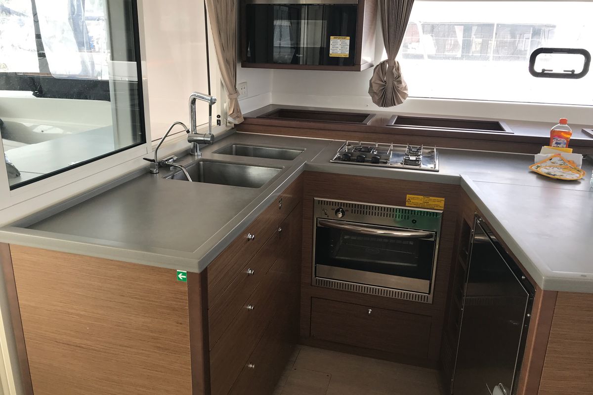 Galley of Cor Caroli, a Lagoon 450 Fly catamaran at Rosignano Solvay, Italy