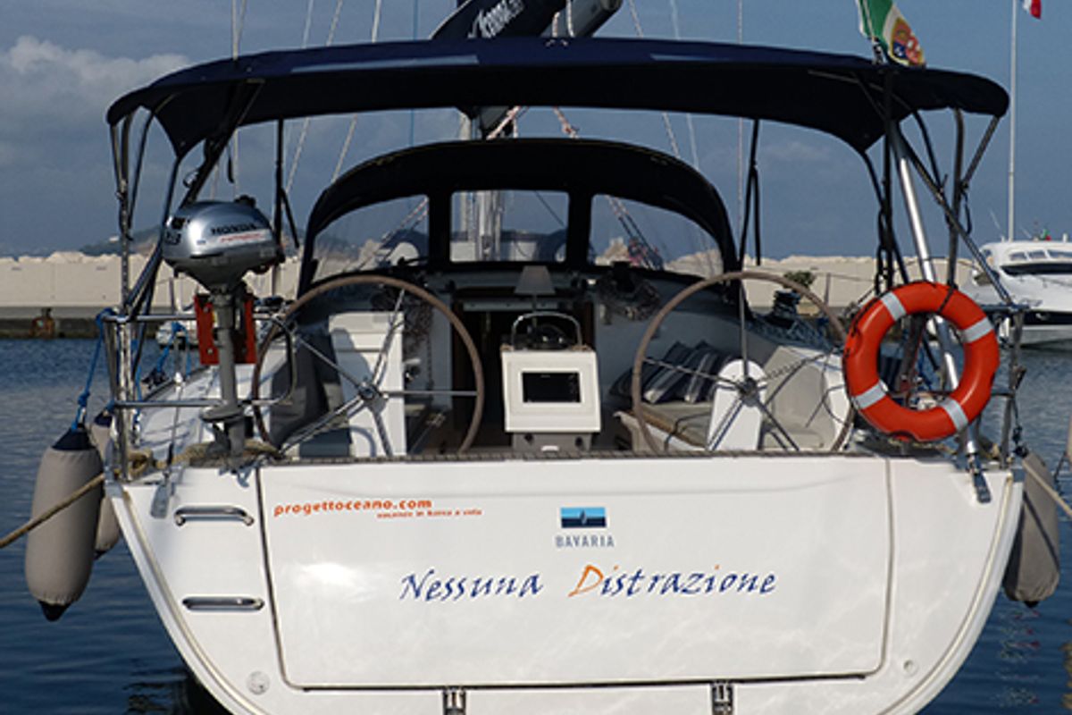 Exterior view of Nessuna Distrazione, a Bavaria Cruiser 41 sailboat at Procida, Italy