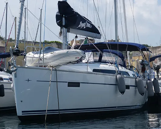 Exterior view of Nessuna Distrazione, a Bavaria Cruiser 41 sailboat at Procida, Italy