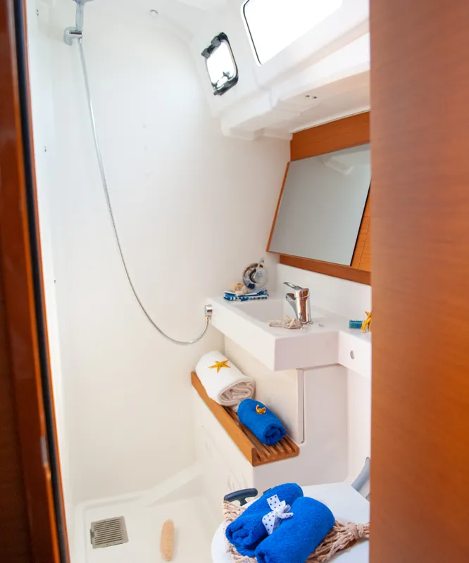 Head on Porto Fino, a Jeanneau Sun Odyssey 490 sailboat at Athens, Greece