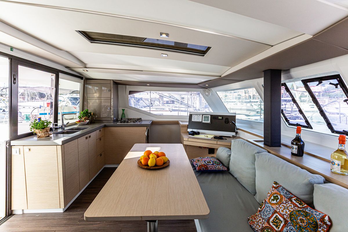 Salon of Relax Planet, a Fountaine Pajot Lucia 40 catamaran at Tonnarella, Italy