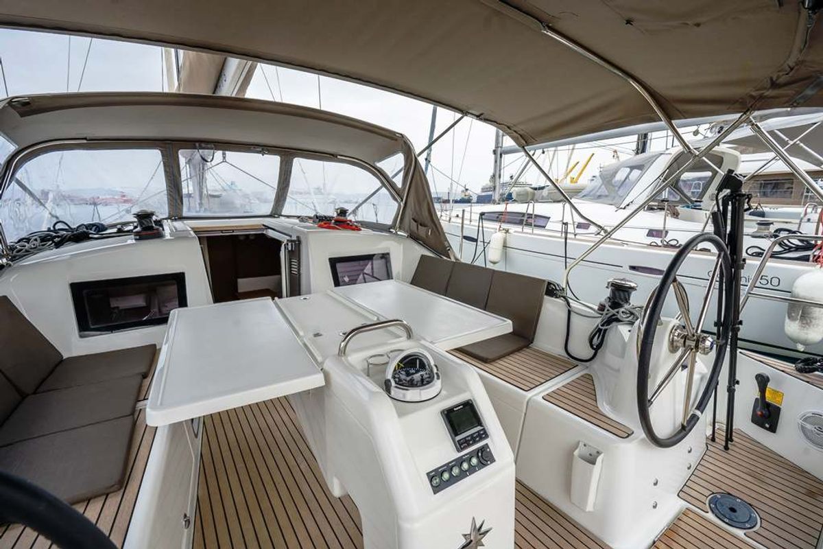 Cockpit of Della Grazia, a Jeanneau Sun Odyssey 410 sailboat at Lavreotiki Municipal Unit, Greece