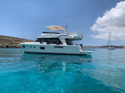 Bandama, a Beneteau Swift Trawler 47 motorboat at Floriana, Malta