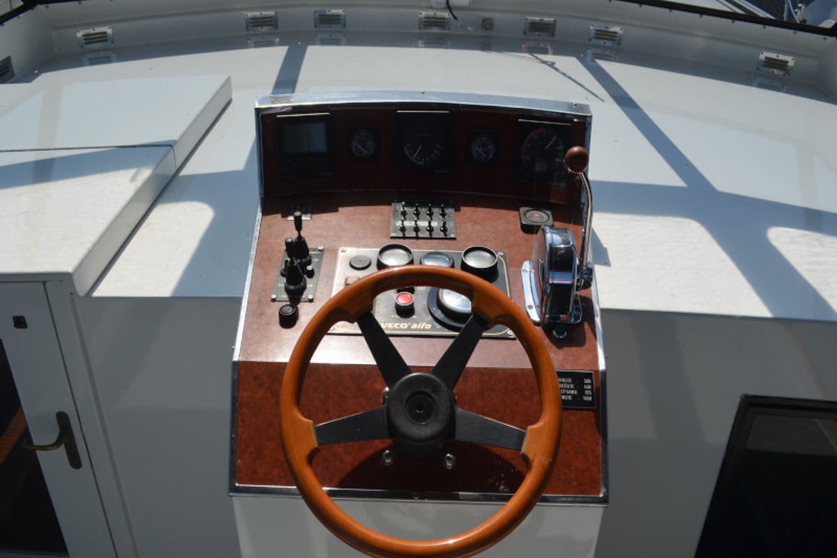 Cockpit of Constellation, a De Drait Tyvano 1450 motorboat at Drachten, Netherlands