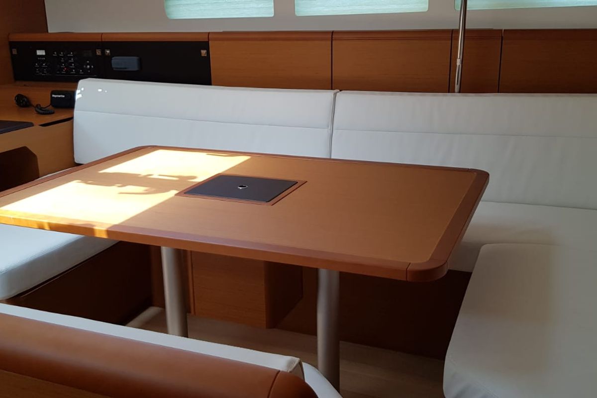 Salon of Pata, a Jeanneau Sun Odyssey 519 sailboat at Cannigione, Italy