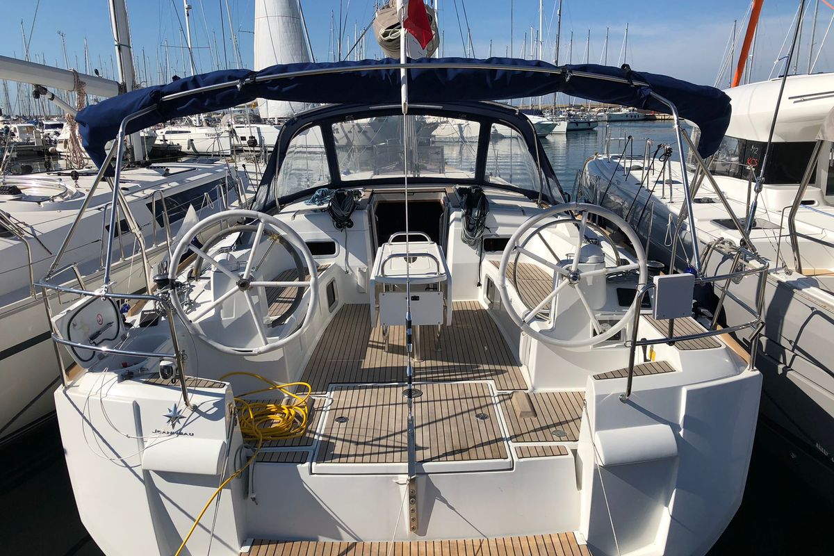 Cockpit of Pata, a Jeanneau Sun Odyssey 519 sailboat at Cannigione, Italy
