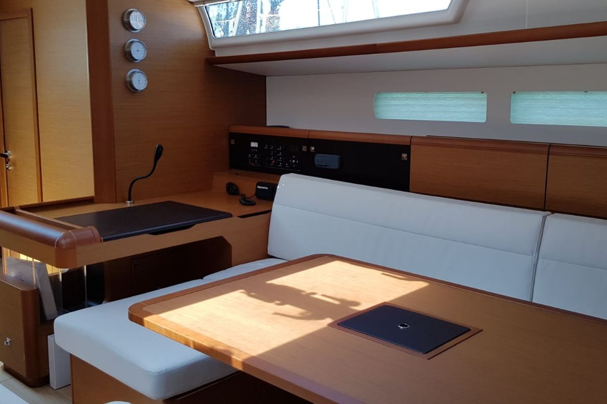 Salon of Pata, a Jeanneau Sun Odyssey 519 sailboat at Cannigione, Italy