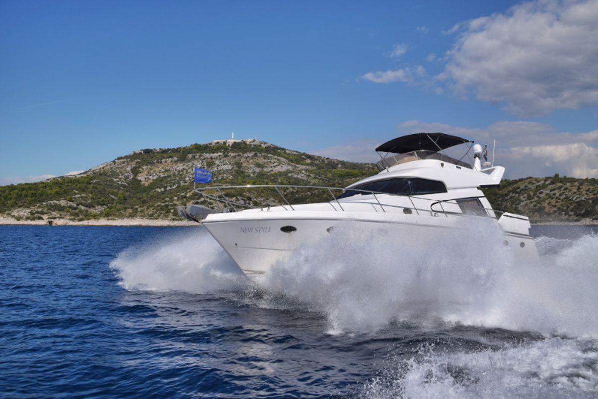 Exterior view of New Style , a Johnson 56 motorboat at Primošten, Croatia