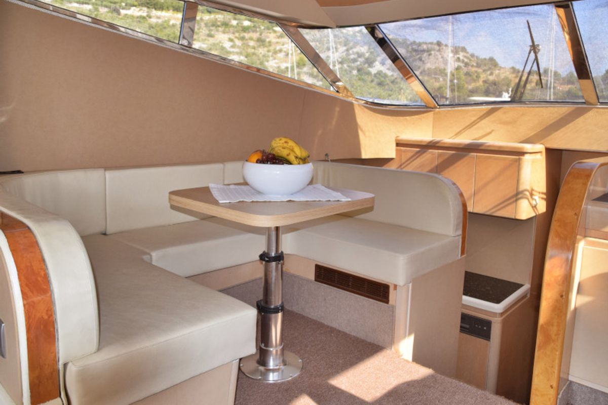 Salon of New Style , a Johnson 56 motorboat at Primošten, Croatia