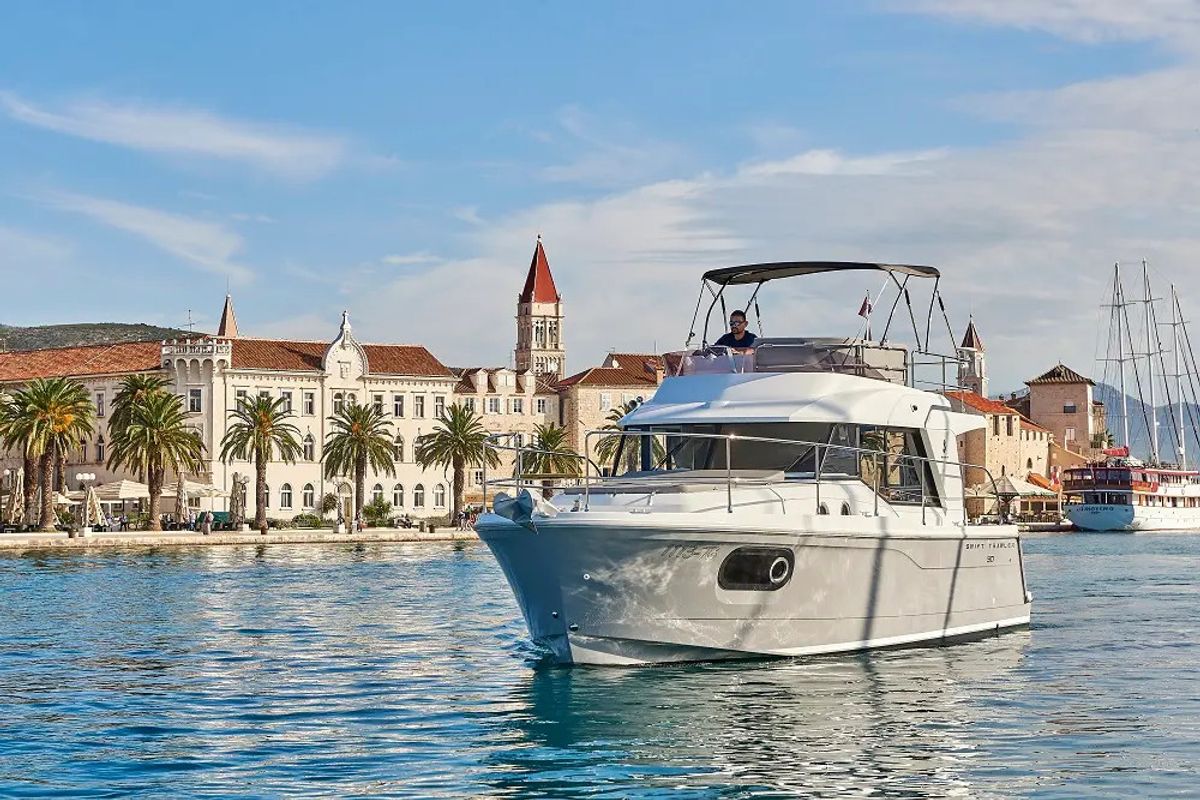 Exterior view of Odysseus, a Beneteau Swift Trawler 30 motorboat at Grad Trogir, Croatia