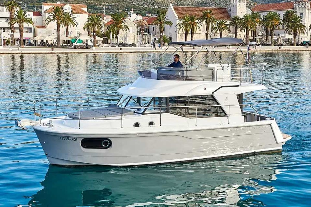 Exterior view of Odysseus, a Beneteau Swift Trawler 30 motorboat at Grad Trogir, Croatia