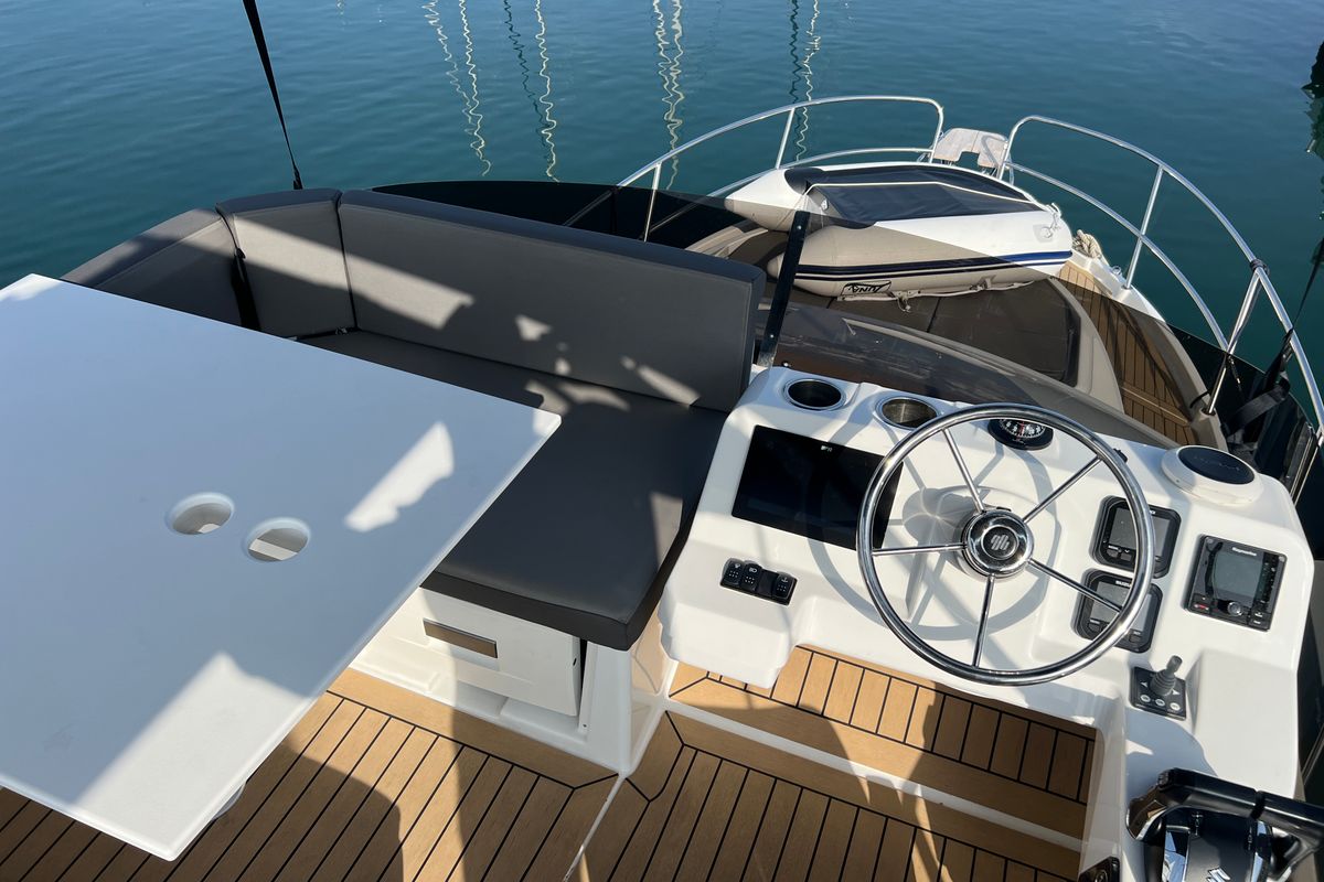 Cockpit of Jean, a Beneteau Antares 11 Fly OB motorboat at Punat, Croatia