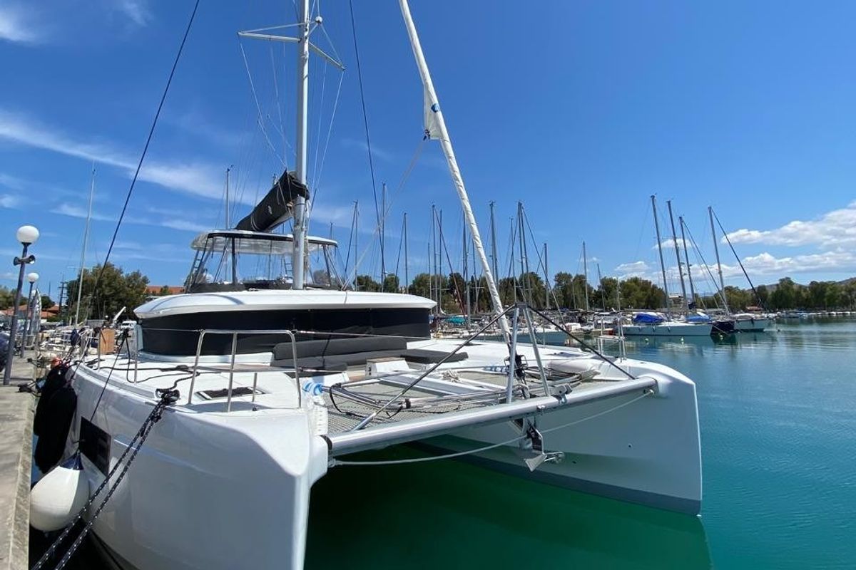 Exterior view of Diamanti IV, a Lagoon 46 catamaran at Skiathos, Greece