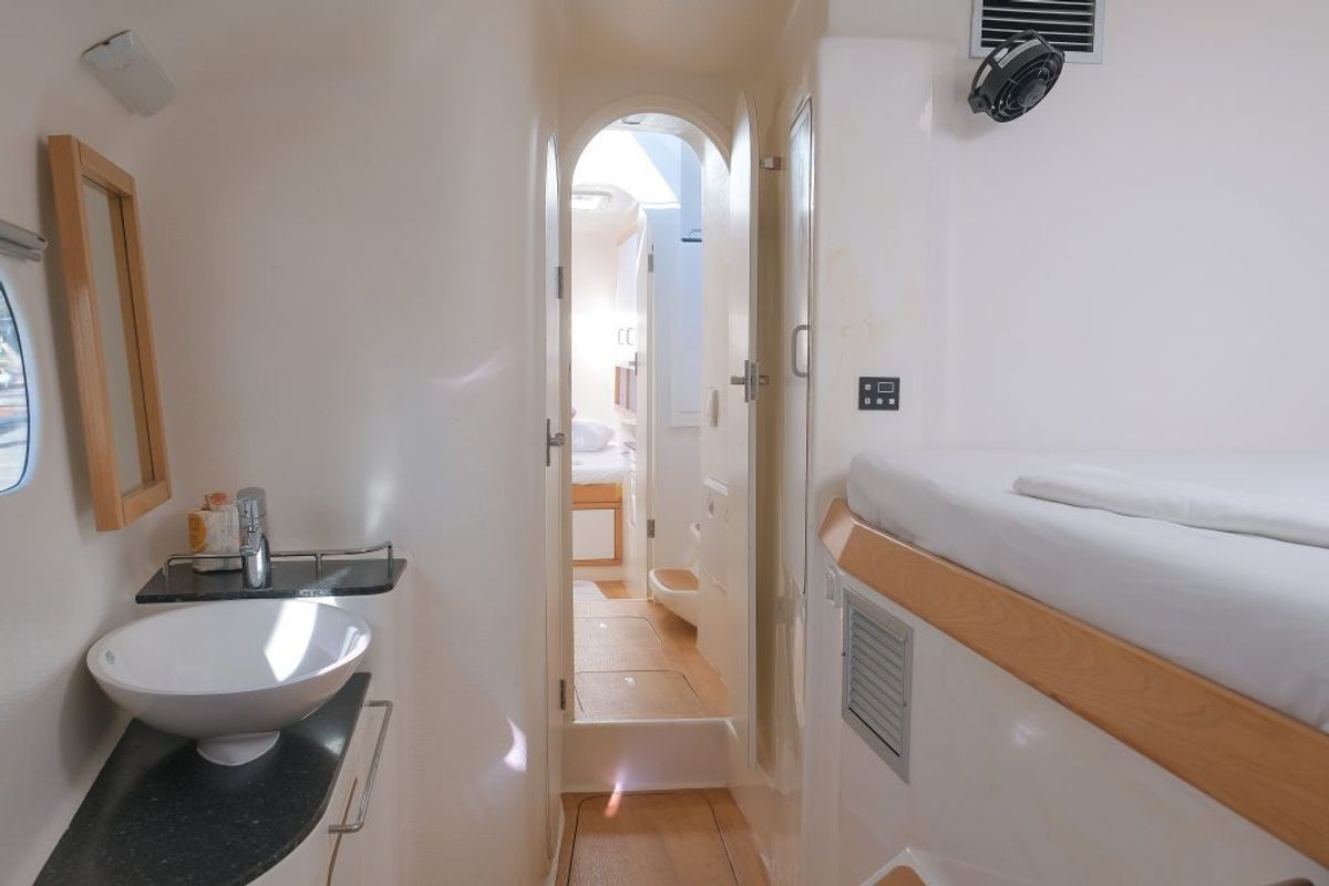 Cabin on Mucho Gusto, a Voyage 480 catamaran at Ribishi, Saint Vincent and the Grenadines