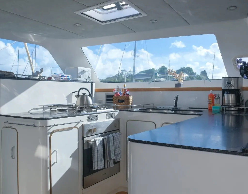 Galley of Mucho Gusto, a Voyage 480 catamaran at Ribishi, Saint Vincent and the Grenadines