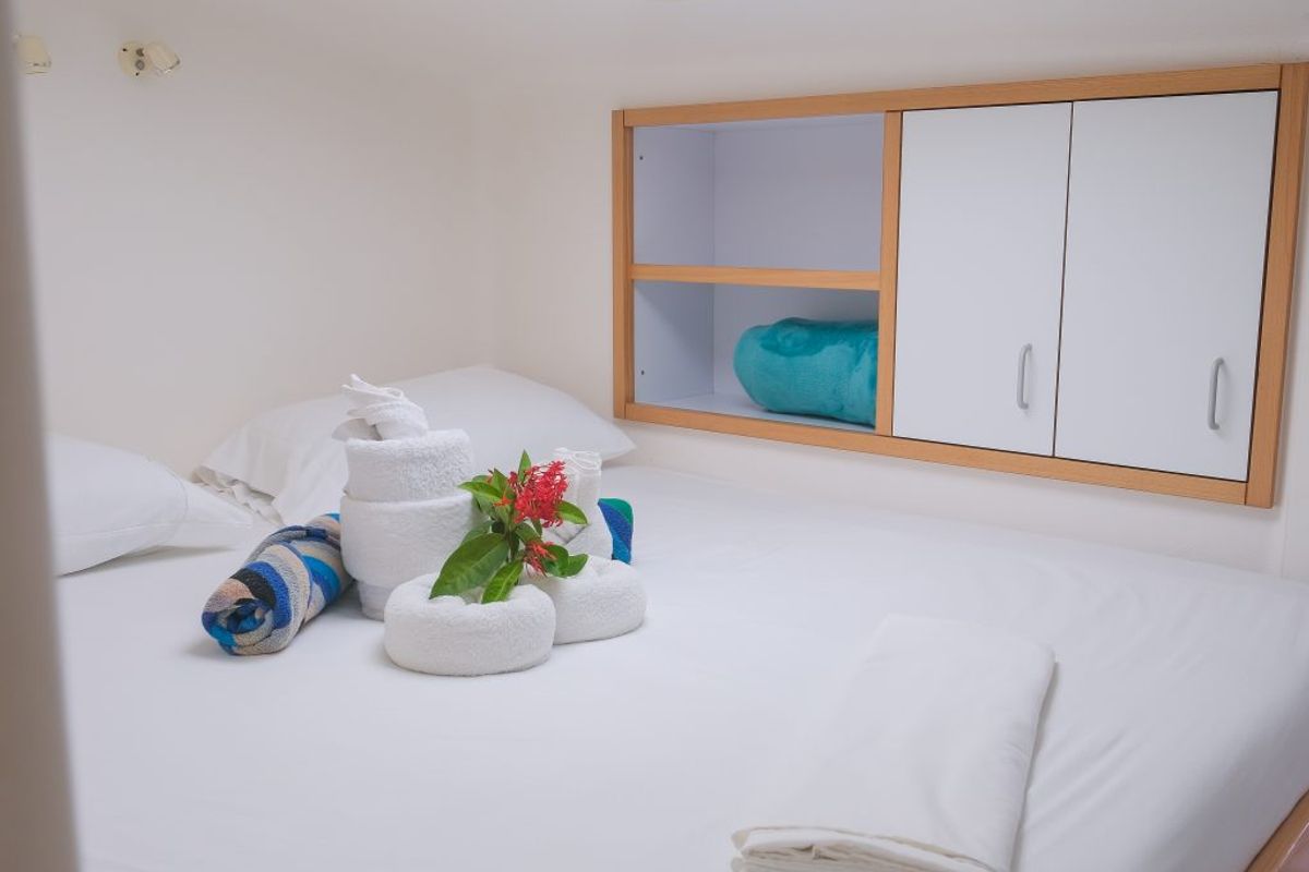 Cabin on Mucho Gusto, a Voyage 480 catamaran at Ribishi, Saint Vincent and the Grenadines