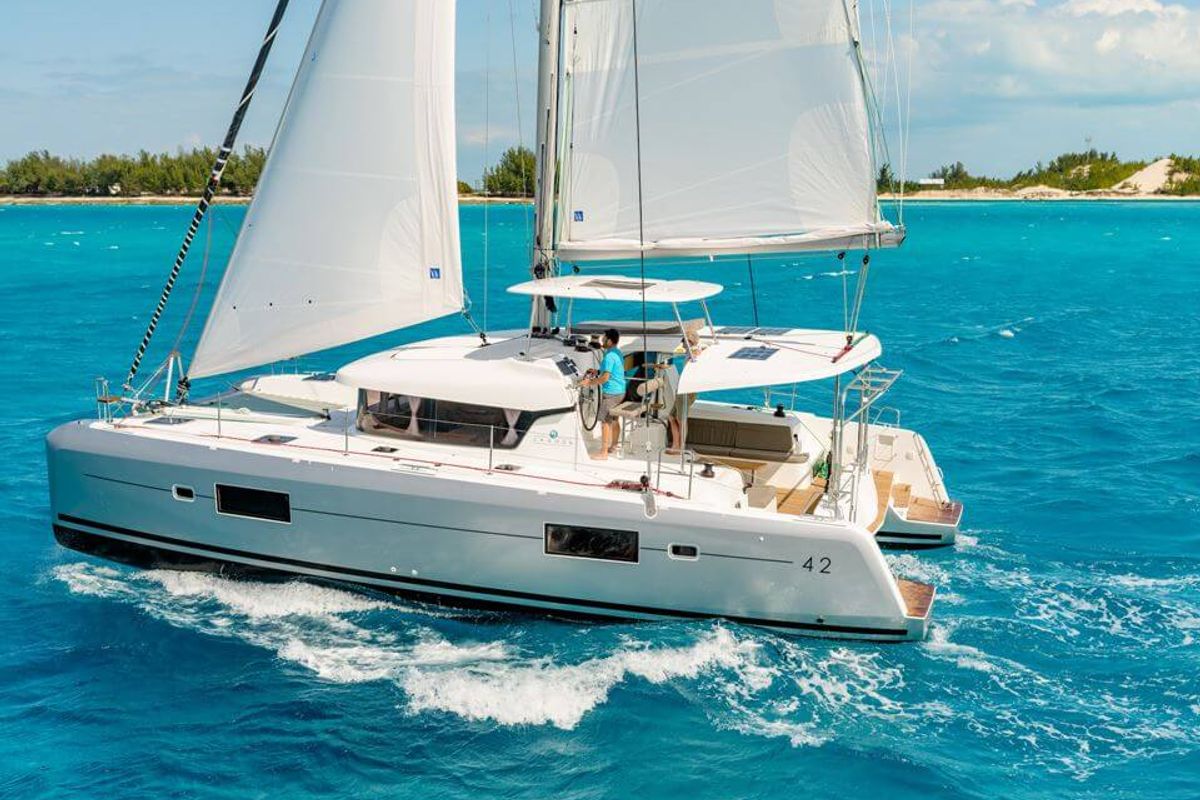 Exterior view of HeyBlue, a Lagoon 42 catamaran at Parikia, Greece