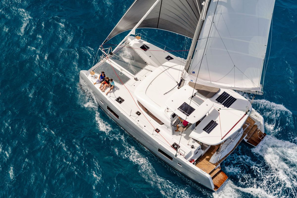 Exterior view of HeyBlue, a Lagoon 42 catamaran at Parikia, Greece