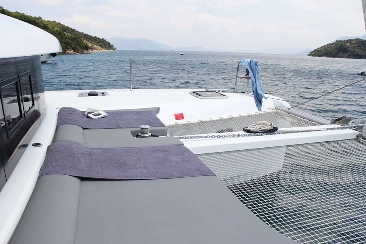 Deck of HeyBlue, a Lagoon 42 catamaran at Parikia, Greece