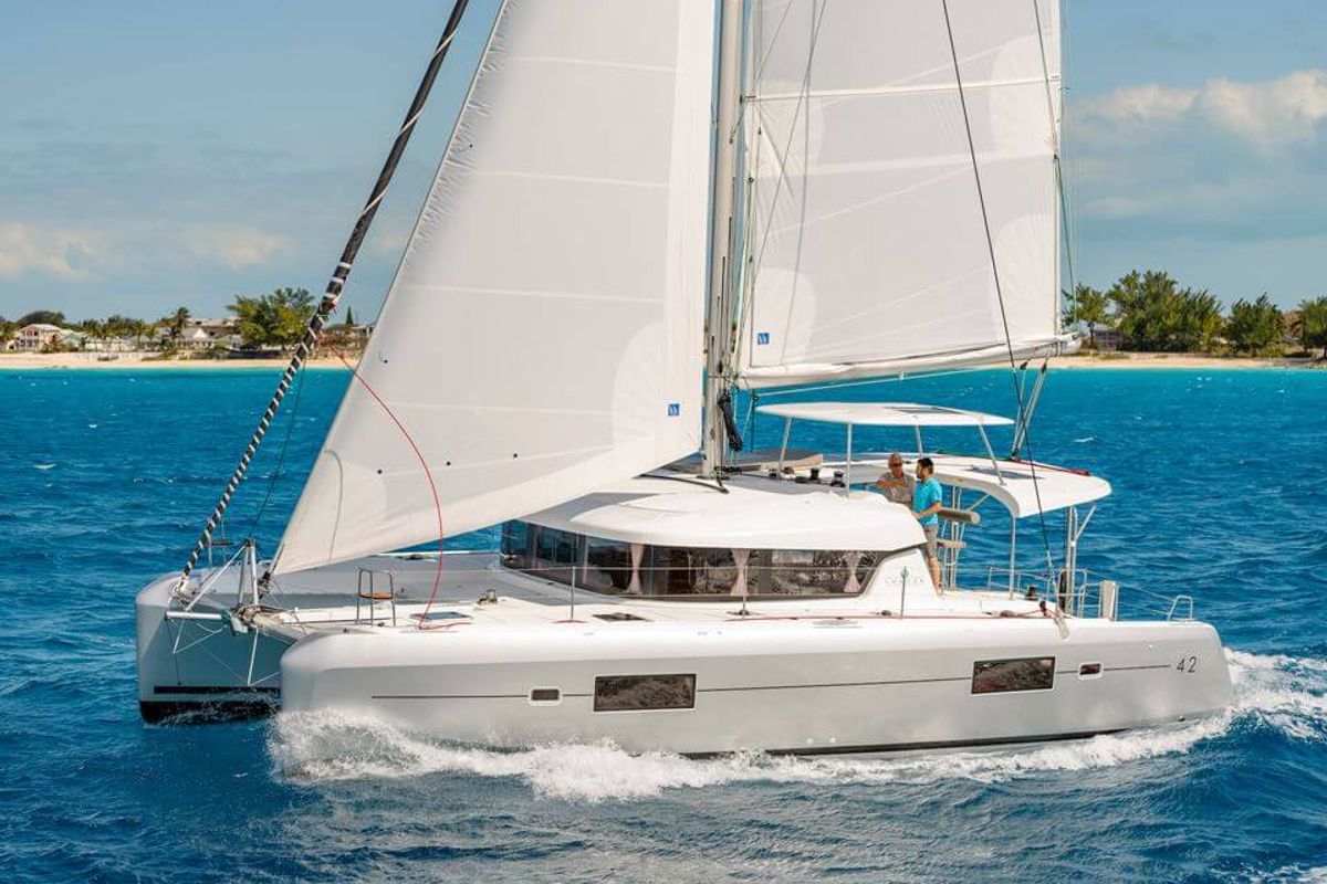 Exterior view of HeyBlue, a Lagoon 42 catamaran at Parikia, Greece