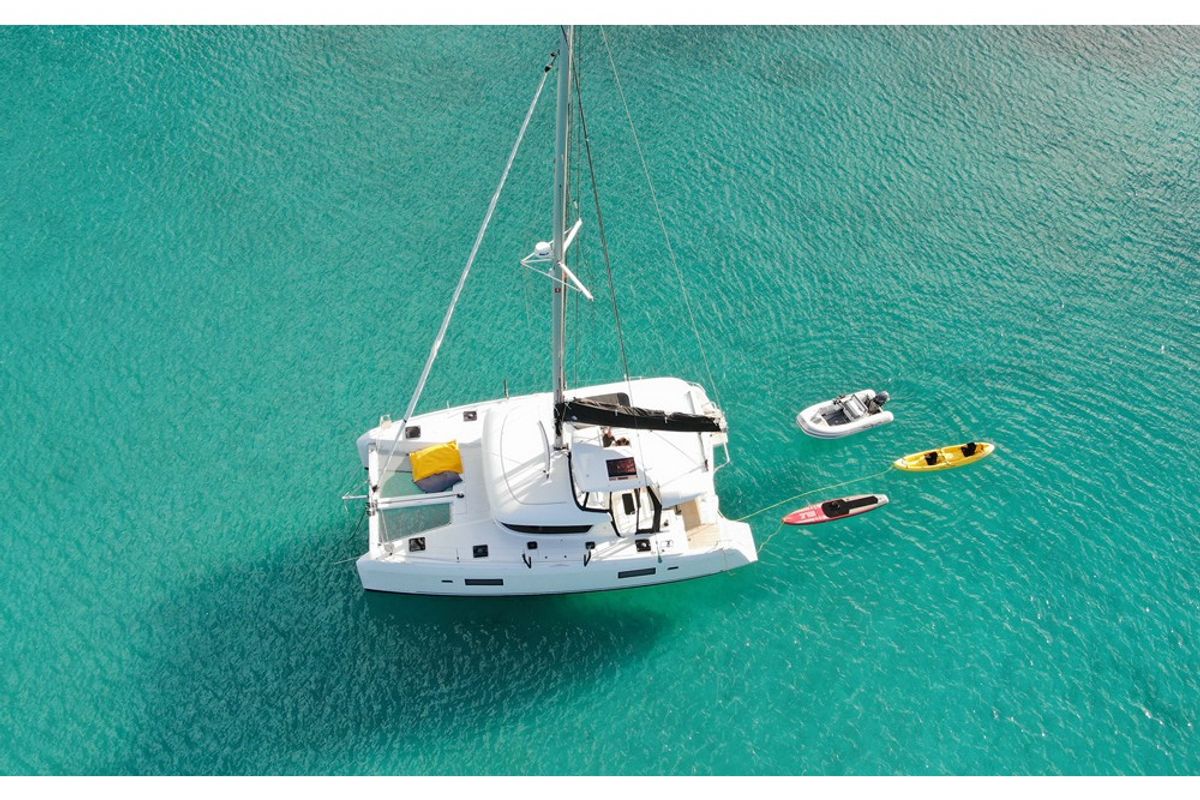 Exterior view of HeyBlue, a Lagoon 42 catamaran at Parikia, Greece