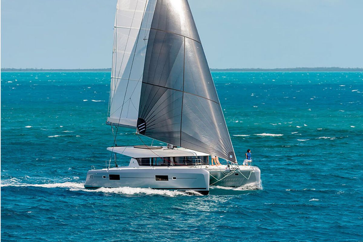 Exterior view of HeyBlue, a Lagoon 42 catamaran at Parikia, Greece
