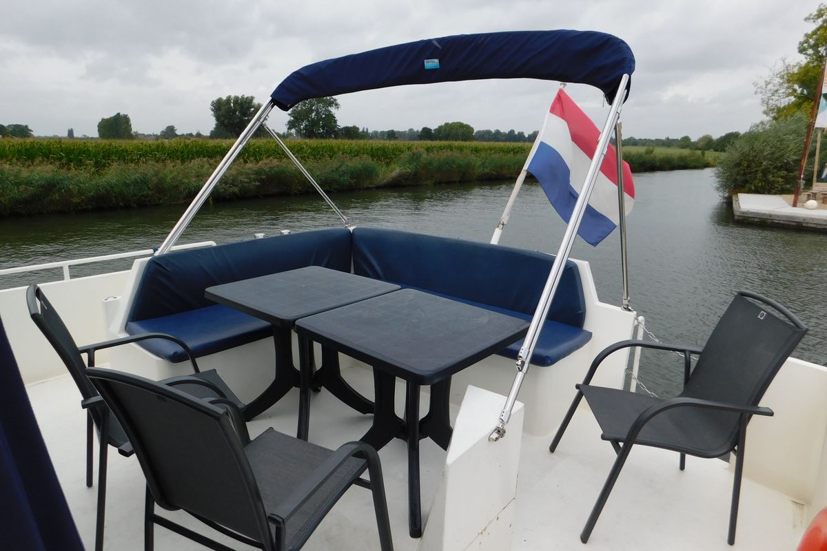 Deck of IJsvogel, a Delos 1430 motorboat at IJsselstein, Netherlands