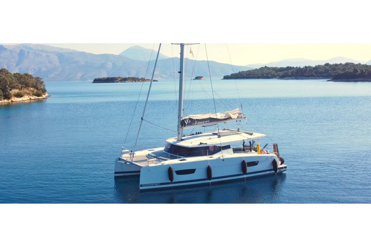 Exterior view of Aifos, a Fountaine Pajot Isla 40 catamaran at Lavreotiki Municipal Unit, Greece