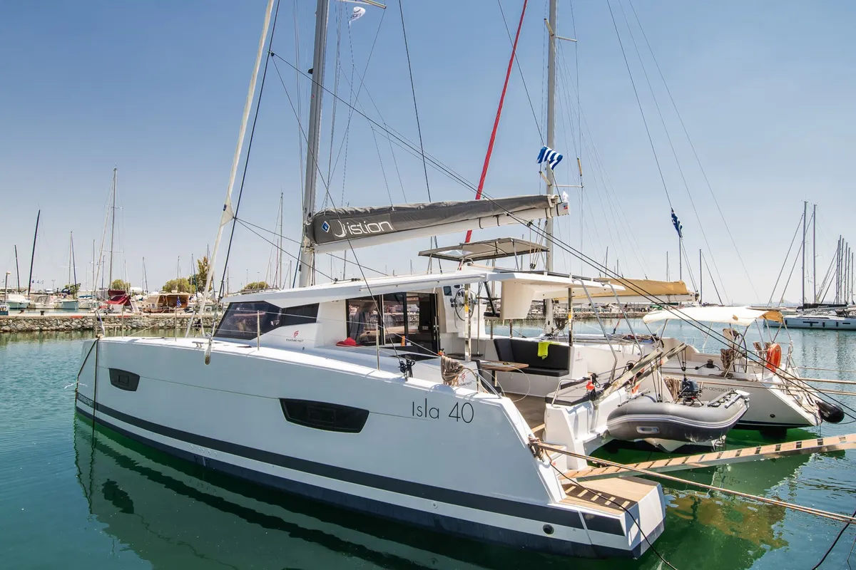 Exterior view of Aifos, a Fountaine Pajot Isla 40 catamaran at Lavreotiki Municipal Unit, Greece