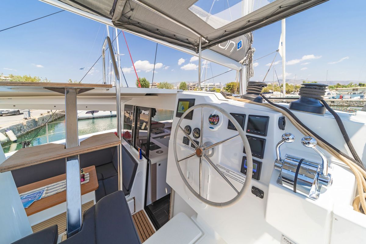 Cockpit of Aifos, a Fountaine Pajot Isla 40 catamaran at Lavreotiki Municipal Unit, Greece