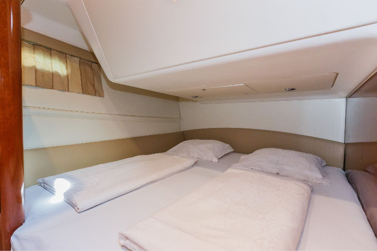 Cabin on Dodo, a Prestige 36 Fly motorboat at Primošten, Croatia