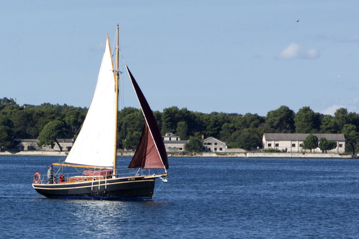 Exterior view of Black Bird, a Unknown Pilot Cutter sailboat at Grad Pula, Croatia