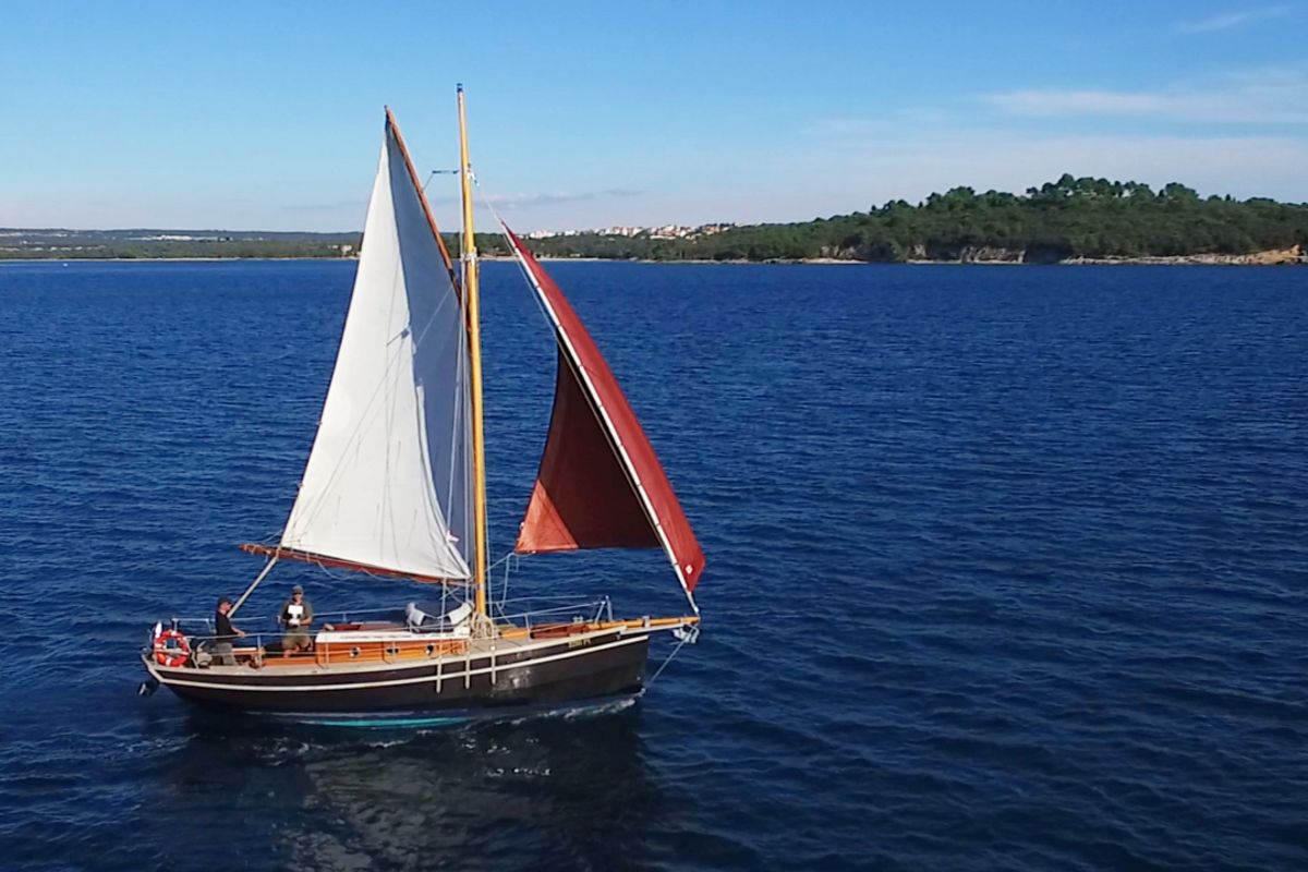 Exterior view of Black Bird, a Unknown Pilot Cutter sailboat at Grad Pula, Croatia