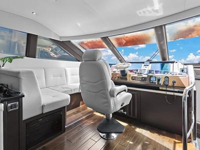 Cockpit of After Parr T, a Marquis Yachts Marquis 720 Flybridge yacht at Stock Island, United States
