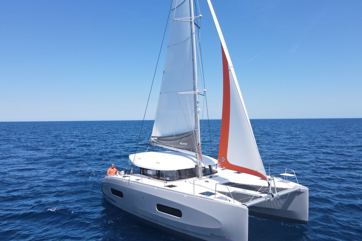 Exterior view of Saona, a Excess 11 catamaran at Ibiza, Spain