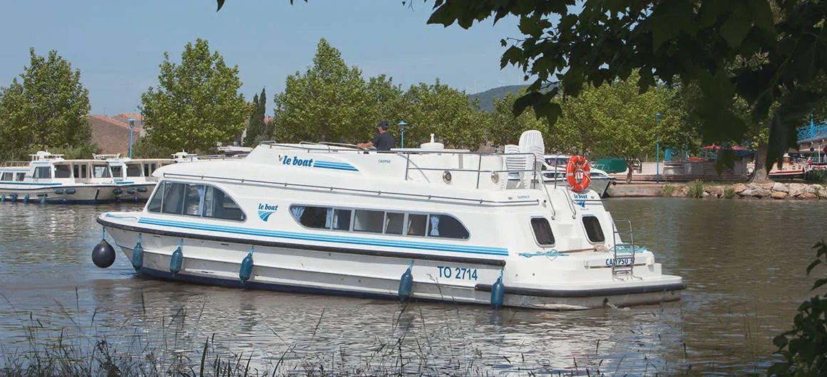 Exterior view of Calypso, a Cygnet Calypso motorboat at Migennes, France