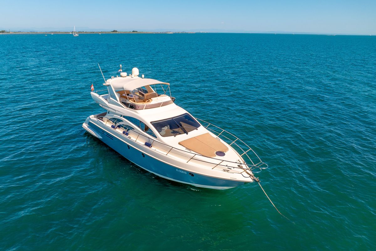 Exterior view of Lena, a Azimut 50 Flybridge yacht at Lignano Sabbiadoro / Lignan, Italy
