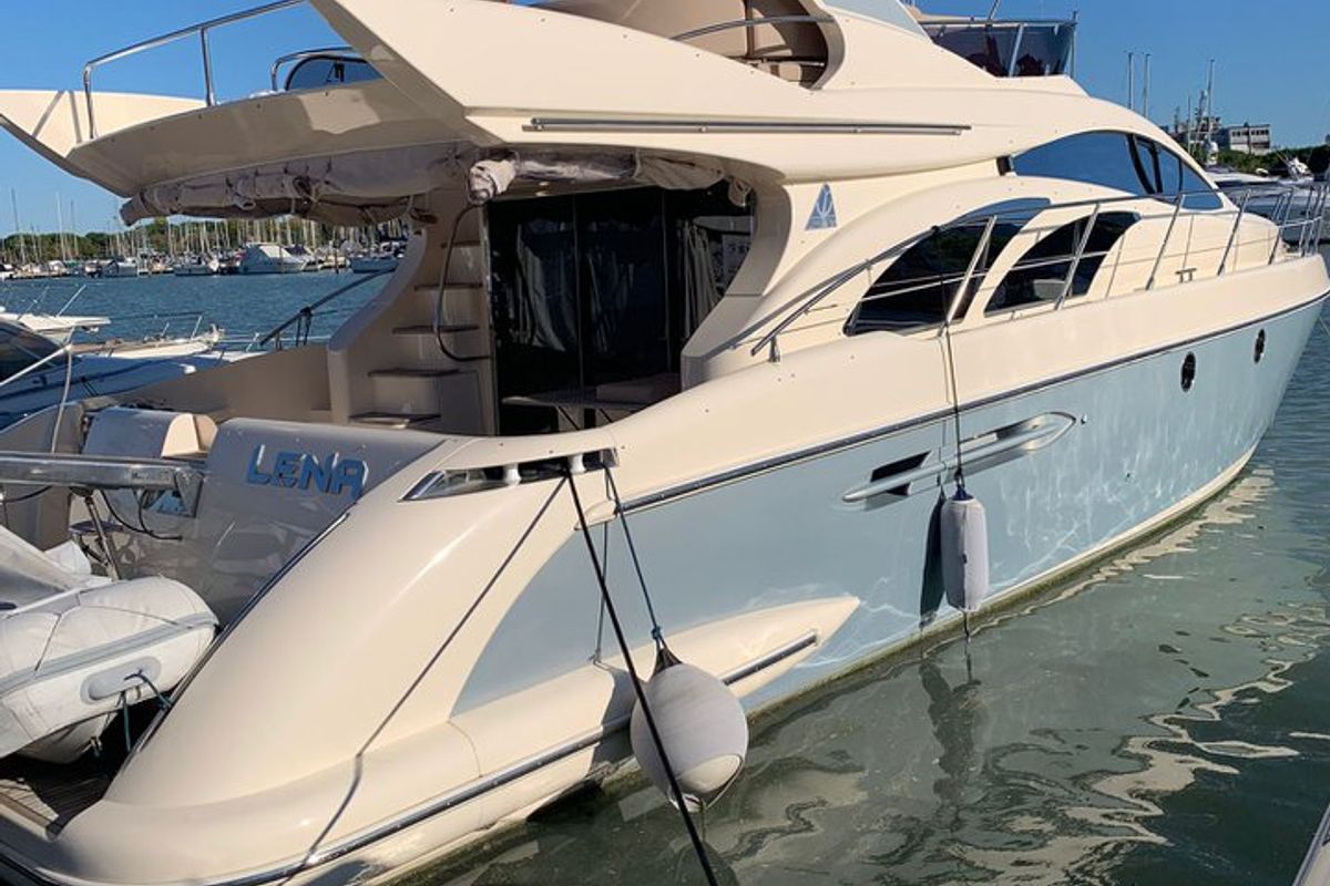 Exterior view of Lena, a Azimut 50 Flybridge yacht at Lignano Sabbiadoro / Lignan, Italy